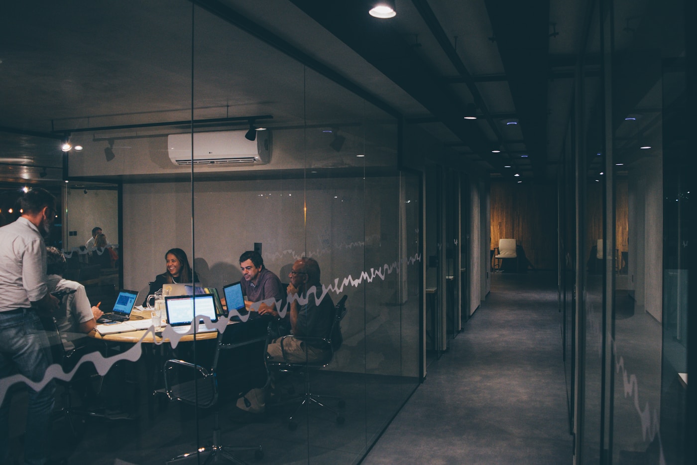 Business professionals reviewing analytics in an office